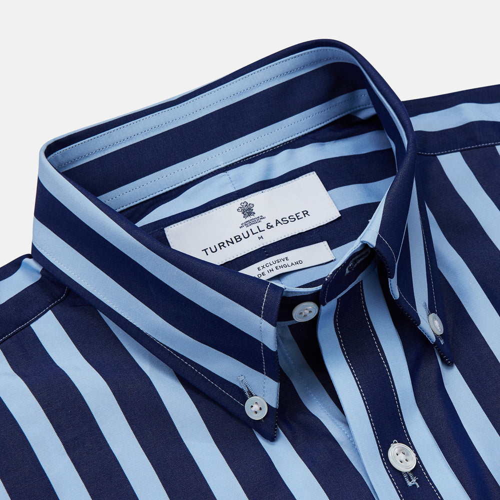 The Turnbull & Asser Navy Multi Stripe Cotton Weekend Fit Suffolk Shirt features vertical blue and navy stripes, a chest pocket, buttoned cuffs, and a classic buttoned Dorset collar.