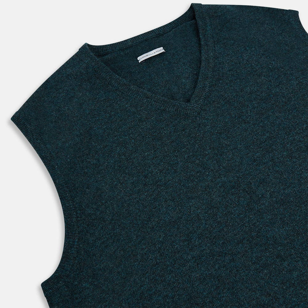 The Turnbull & Asser Forest Green Melange V-neck Cashmere Vest is a refined men’s knitwear piece, sleeveless with a classic V-neckline, shown here against a plain white background.