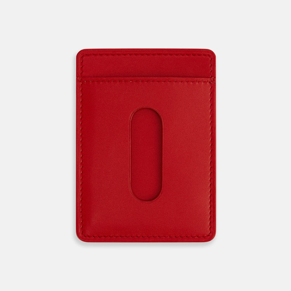 A vibrant red Turnbull & Asser Two-slot Card Case, crafted from Italian leather with the brand name embossed in white, is shown on a plain white background—a sleek and minimalist accessory.