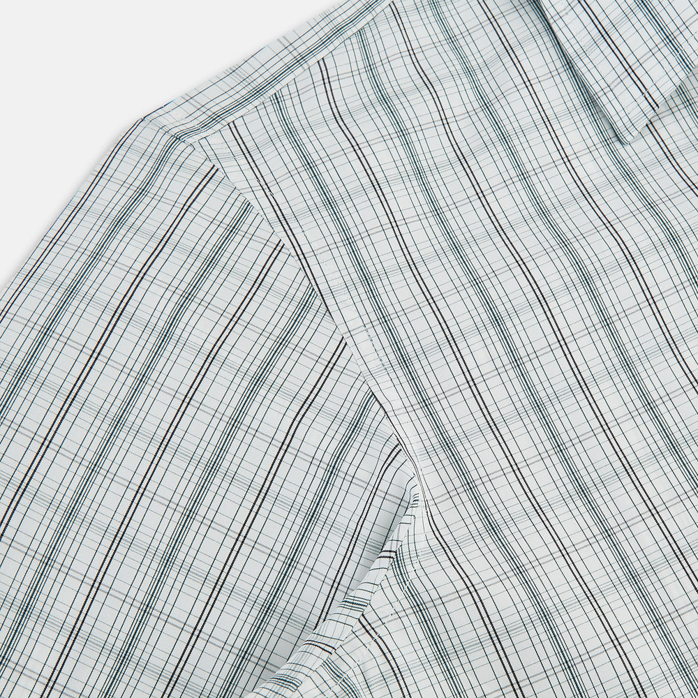 The Turnbull & Asser Forest Green Multi Check Westminster Shirt is a tailored, long-sleeved, button-up shirt with a collar and a white base featuring light blue and green plaid, displayed flat on a white background.