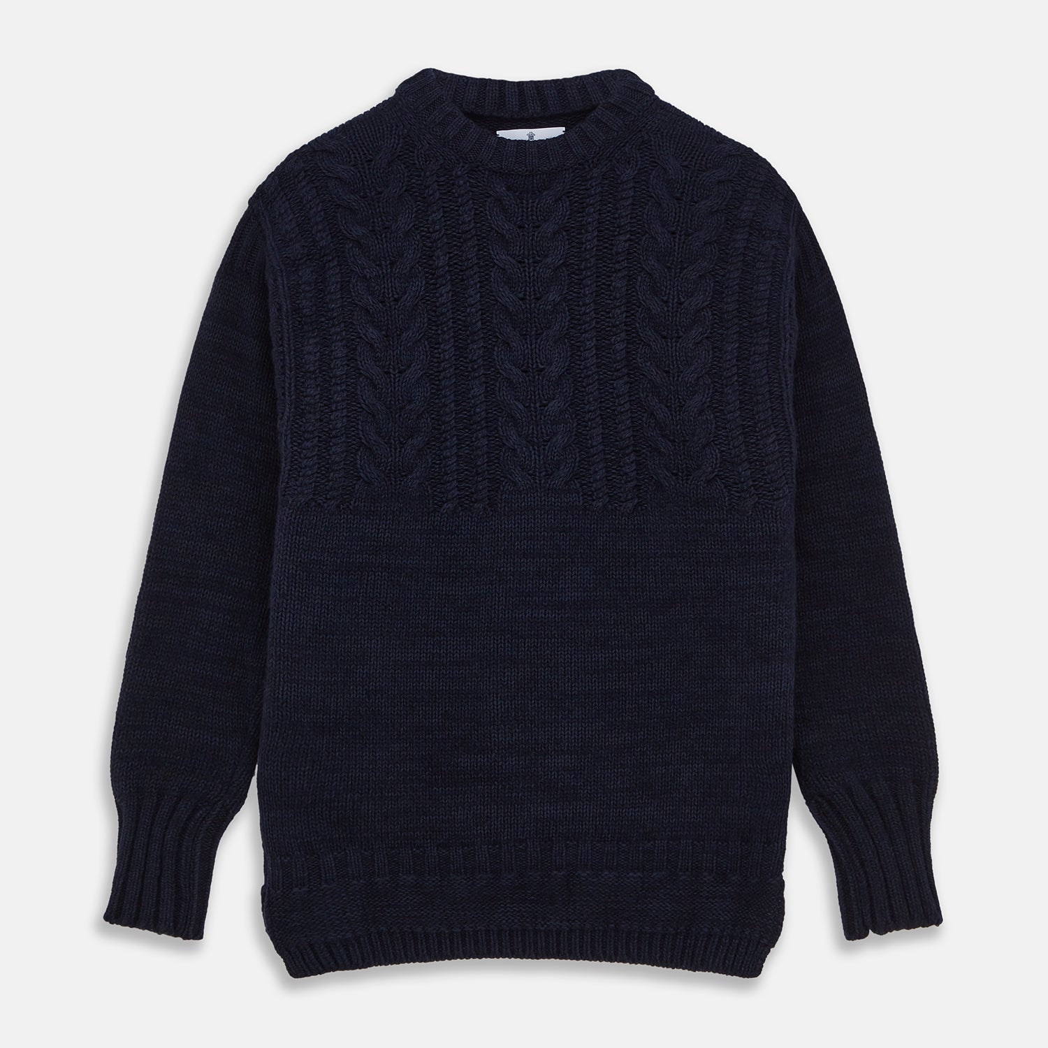 View 1 of product The Turnbull & Asser Navy Wool and Cotton Blend Albany Guernsey Jumper, shown flat on a white background, features long sleeves, a classic cable knit pattern on the upper half, and ribbed cuffs, hem, and collar.