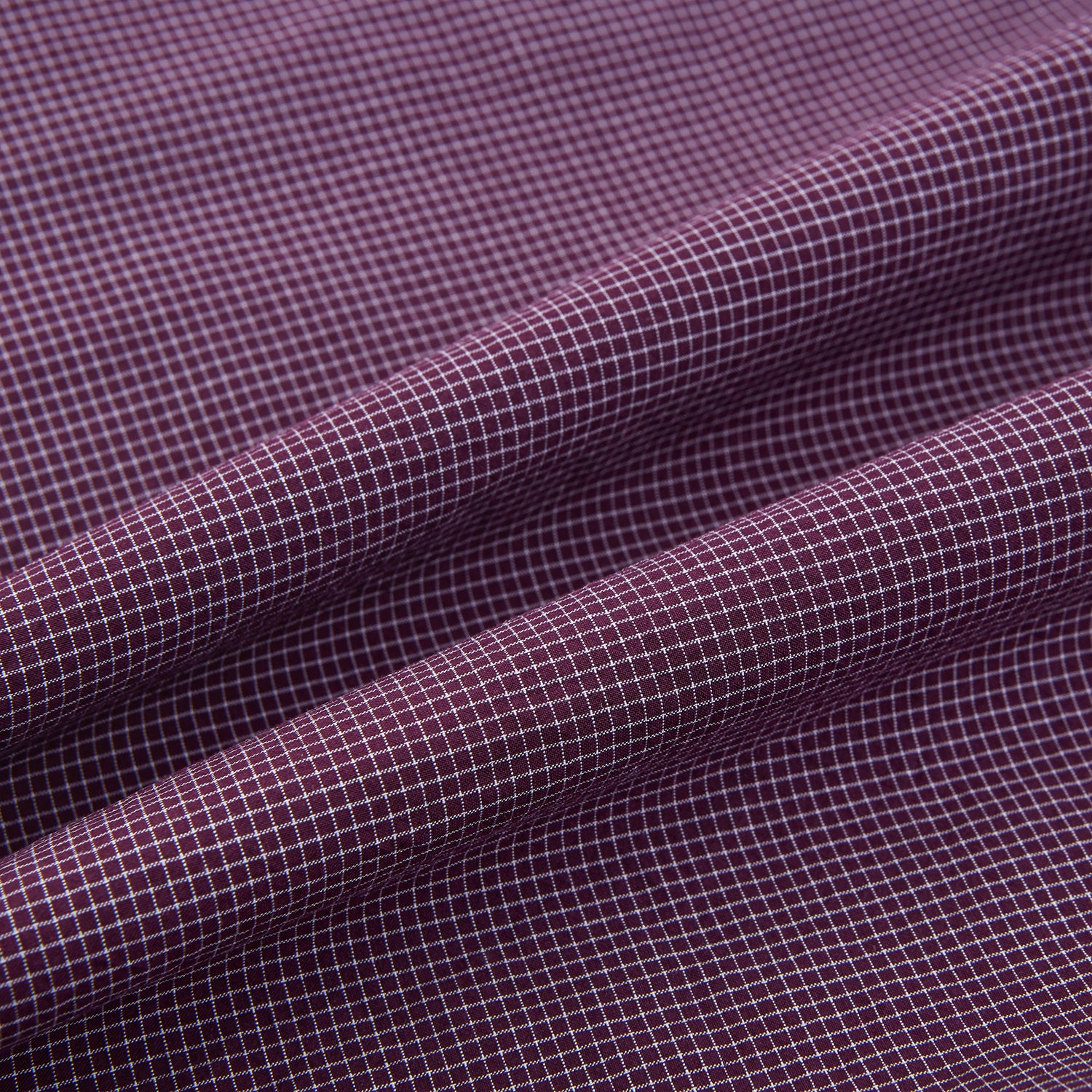 View 4 of product The Turnbull & Asser Burgundy Pin Check Padded Gilet features a front zipper, two zippered side pockets, a chest pocket, and a rounded hem—an ideal men’s layering piece shown on a white background.