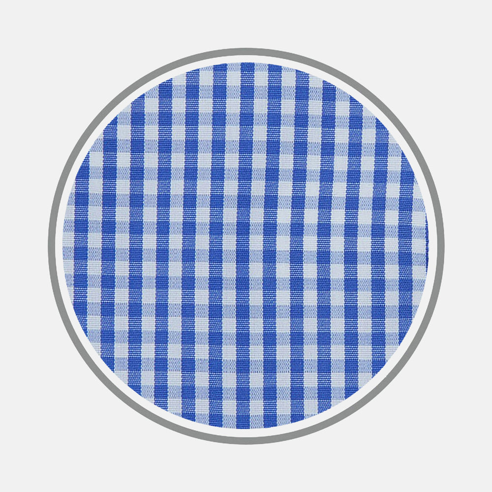 A circular swatch of Turnbull & Asser's Mid Blue Gingham Check Cotton Fabric, featuring a blue and white check pattern and a gray border, is shown against a plain white background.