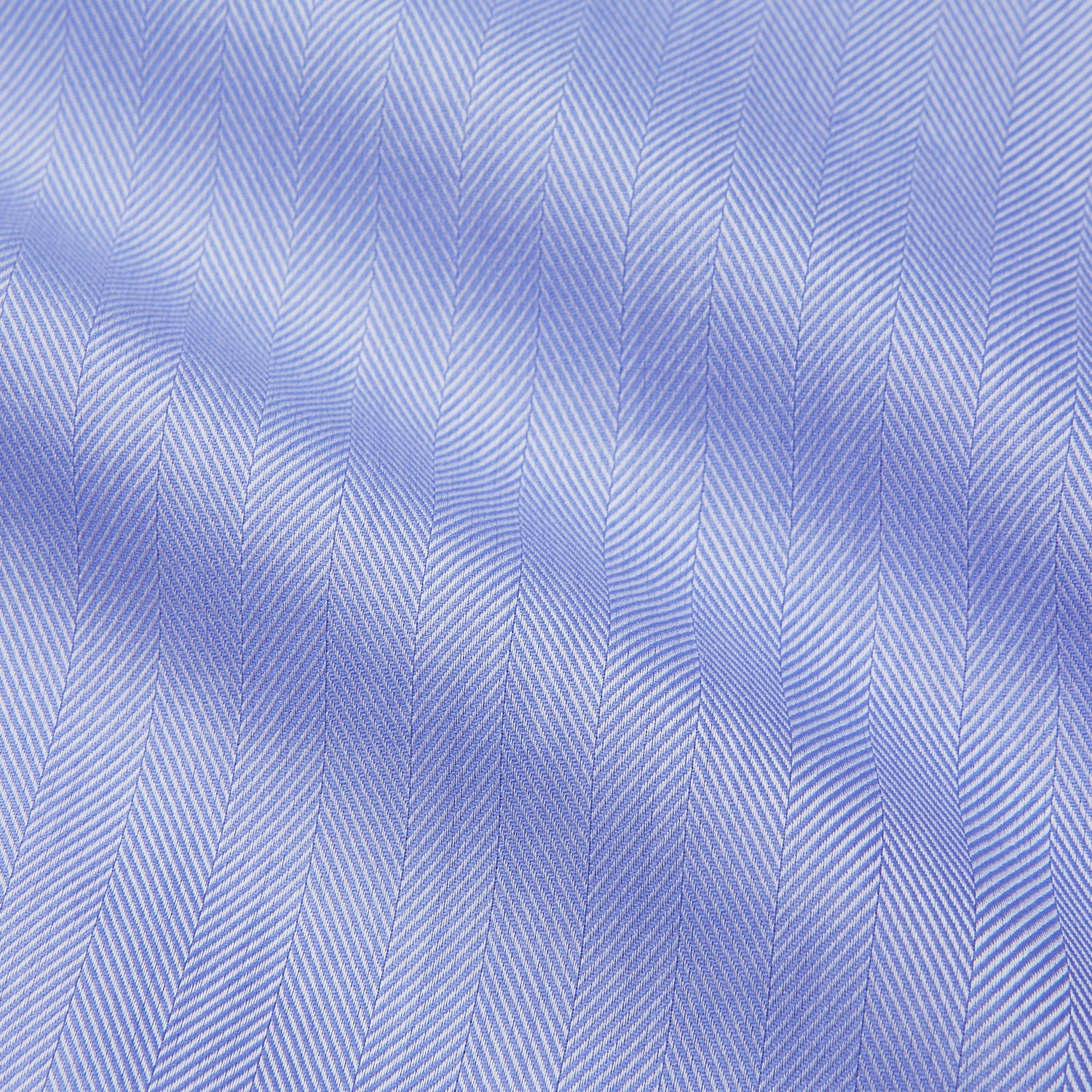 View 2 of product The Turnbull & Asser Blue Herringbone Regular Fit Shirt features a classic Kent collar, long sleeves, white buttons, and buttoned cuffs. Displayed on a white background, it's the perfect formal shirt for any occasion.