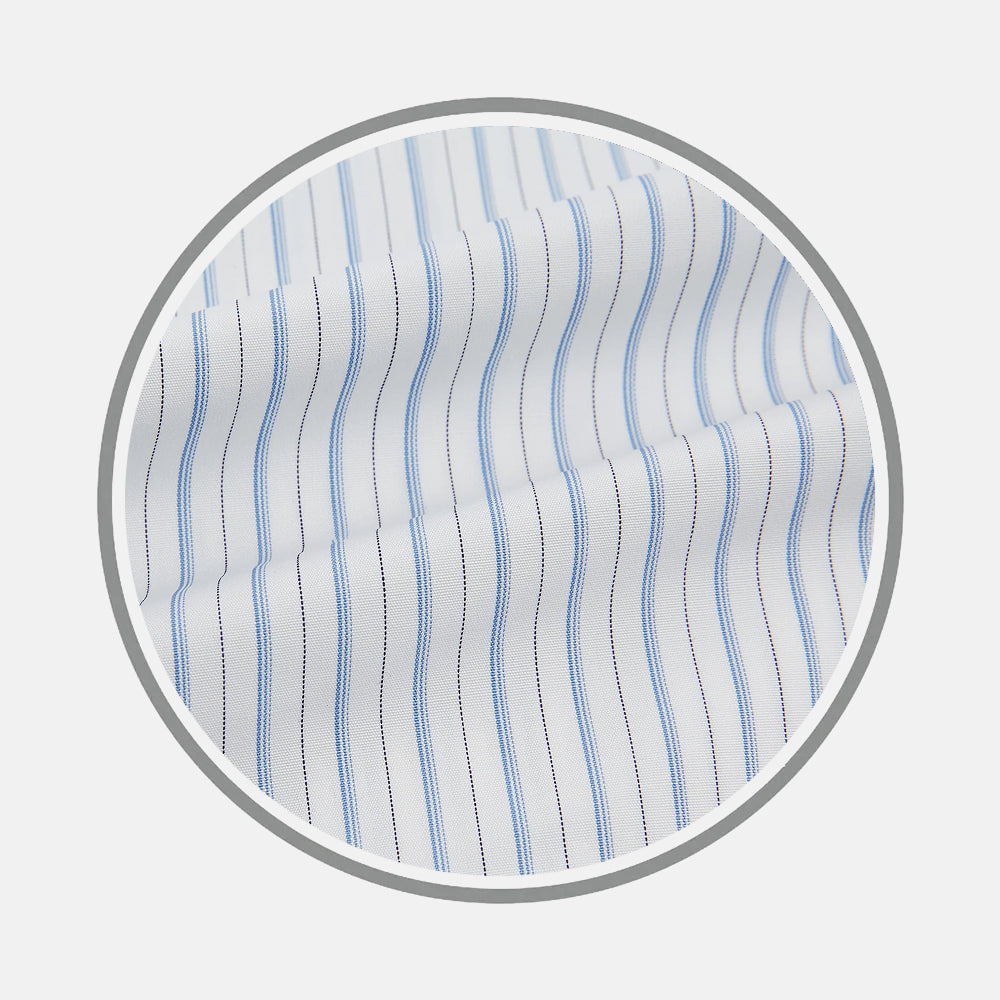 Close-up of Turnbull & Asser Sky Blue Combination Stripe Fabric, featuring vertical light blue and thin dark blue pinstripes on white, slightly wrinkled and shown within a circular frame against a plain background.