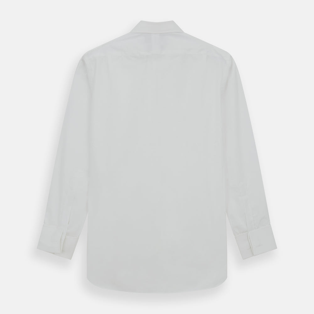 The Turnbull & Asser Plain White Cotton Shirt features a T&A collar and double cuffs, shown flat on a white background—ideal for pairing with standout ties or achieving a minimalist look.