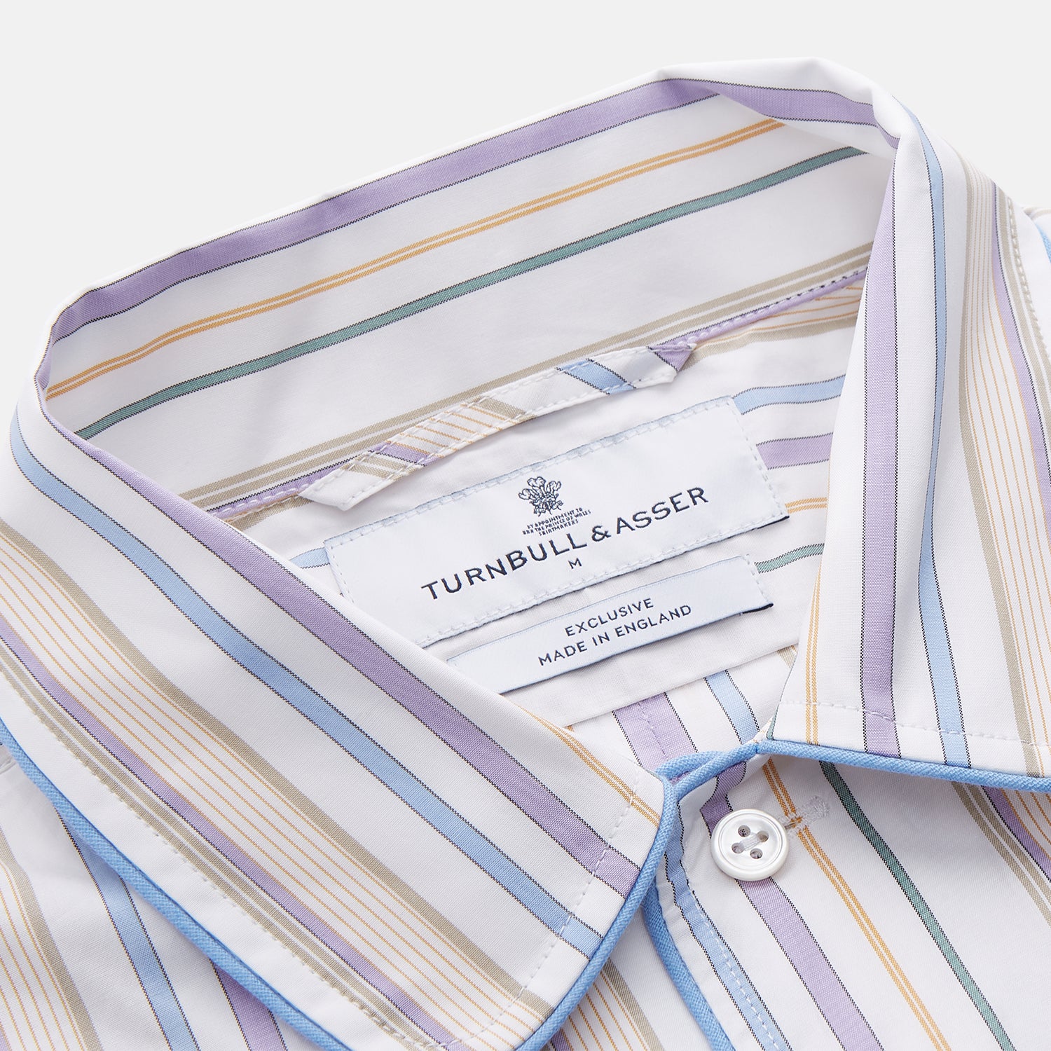 View 4 of product The Turnbull & Asser Colourful Garden Multi Stripe Cotton Sussex Nightshirt is UK-made, featuring vibrant stripes on white for timeless style and luxurious sleepwear comfort.