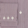 View 4 of product The Turnbull & Asser Burgundy Shadow Stripe Mayfair Shirt is a long-sleeved button-up with thin vertical burgundy stripes, classic collar, and buttoned cuffs, shown laid flat on a white background.