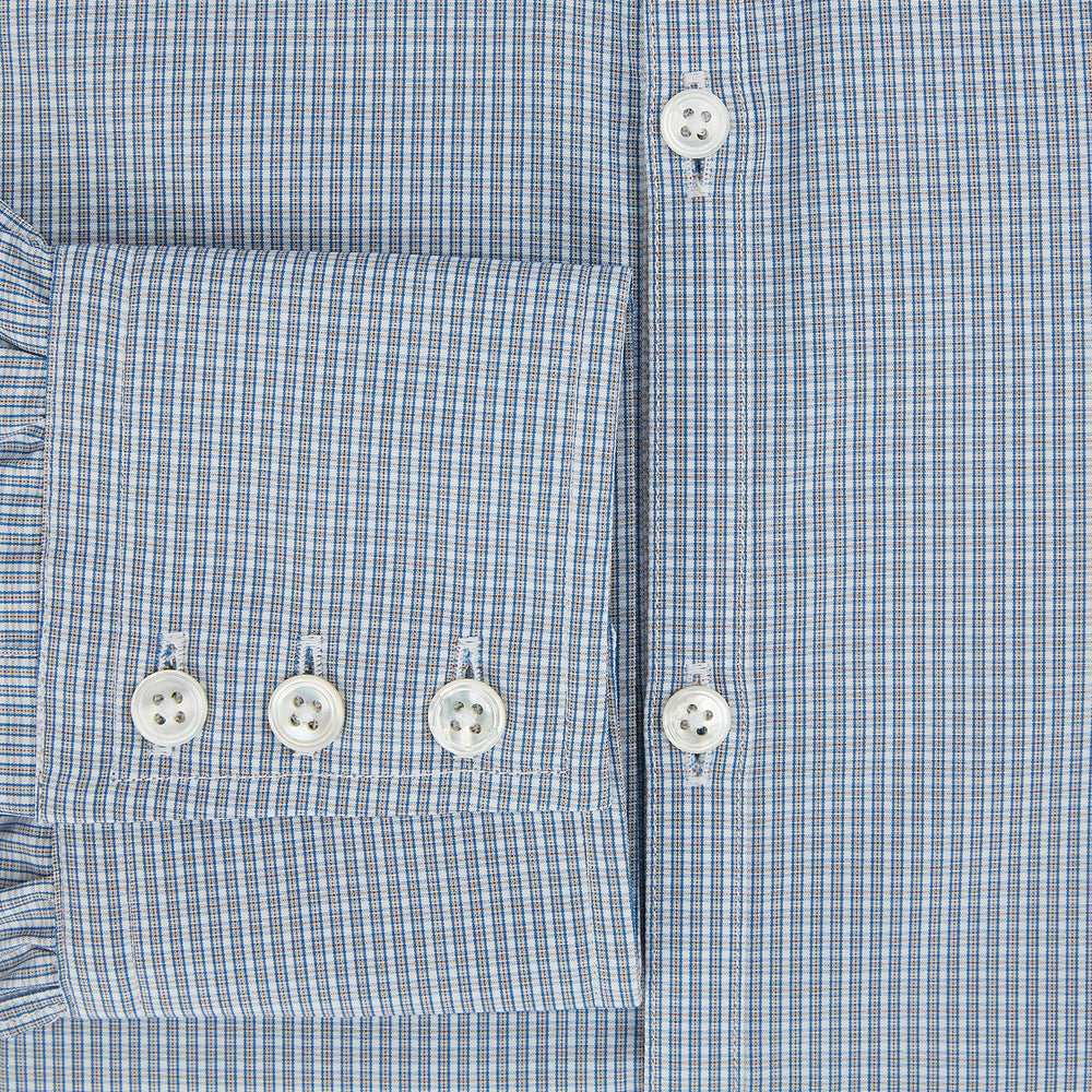 The Turnbull & Asser Blue and Brown Micro Shadow Check Westminster Shirt features a refined collar and white buttons, showcasing timeless British craftsmanship.