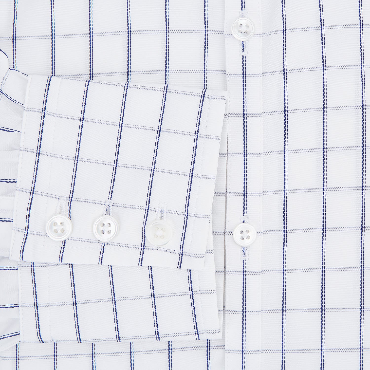 View 4 of product A Dark Navy Double-Line Checked Westminster Shirt by Turnbull & Asser, featuring button-down front, pointed collar, and buttoned cuffs—displaying British craftsmanship—laid flat on a white background.