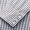 View 3 of product The Turnbull & Asser Pale Blue Multi Check Cotton Regular Fit Mayfair Shirt features a pale blue checkered pattern and long sleeves, shown on a white background.