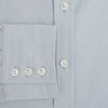 View 4 of product The Dove Grey Mayfair Shirt by Turnbull & Asser is a long-sleeve button-up with a collar, front pocket, and white buttons, crafted from soft sanforised cotton and laid flat on a white background.
