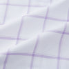 View 6 of product The Turnbull & Asser Lilac Grid Check Mayfair Shirt is a long-sleeve, button-up style crafted from Italian cotton with a white base and lilac grid check pattern, shown on a plain white background.