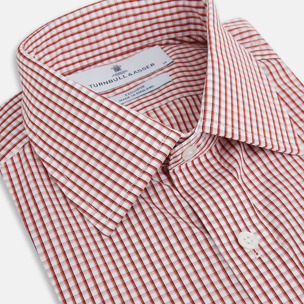 The Turnbull & Asser Red Micro Shadow Check Mayfair Shirt, made from premium Italian cotton with a classic collar and buttoned cuffs, is shown on a plain white background.