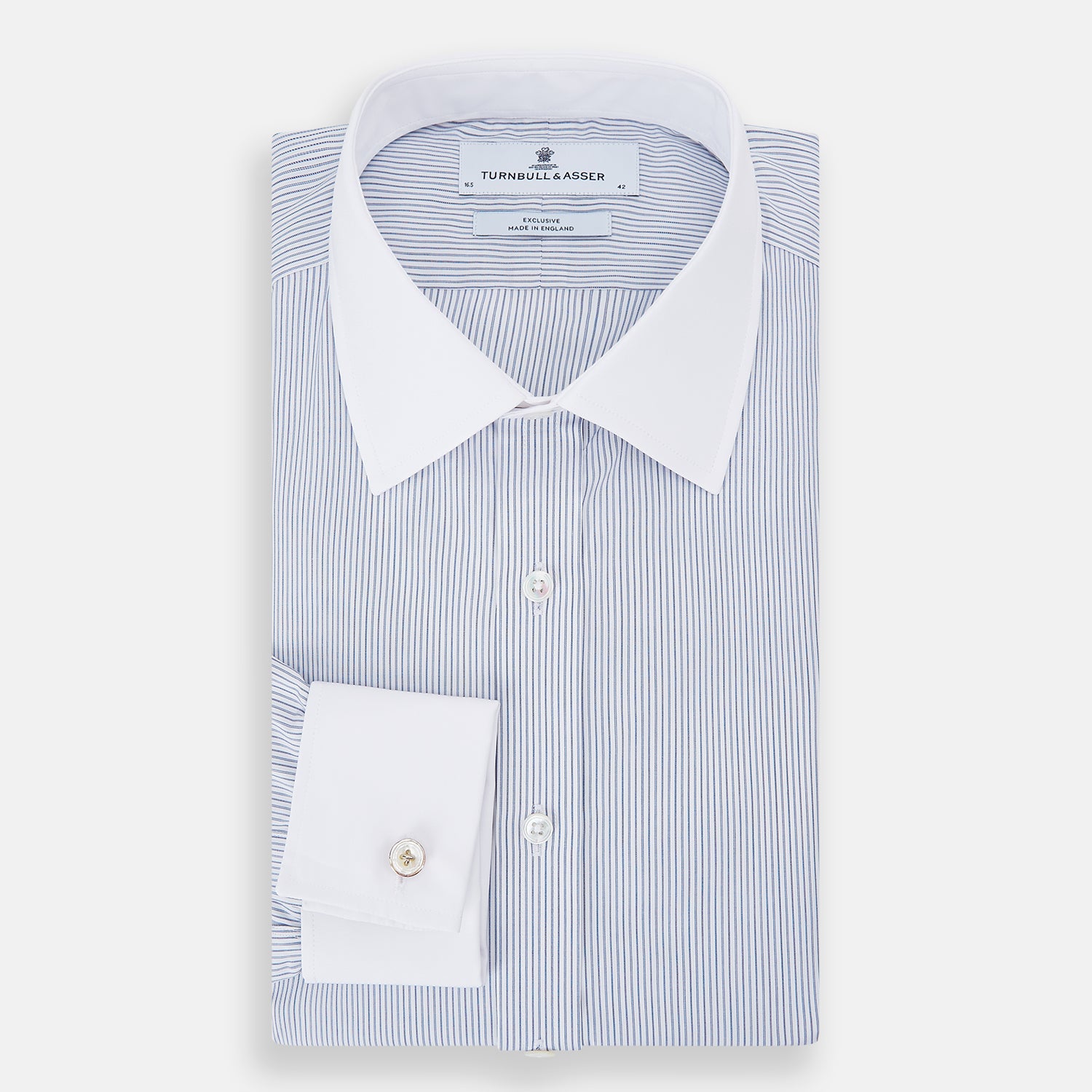 View 5 of product The Turnbull & Asser Navy and Blue Ticking Stripe Shirt features a contrast white collar and double cuffs, displayed on a plain white background. Tailored in the sleek Mayfair fit, it’s ideal for formal attire.