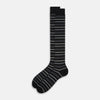 View 2 of product The Turnbull & Asser Chocolate Melange Striped Merino Wool Long Sock features black, dark gray, and light gray horizontal stripes and is displayed individually on a white background.