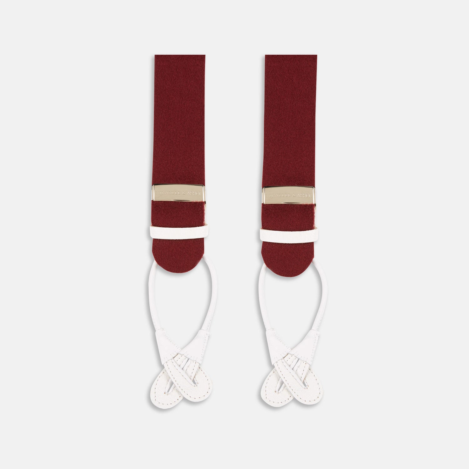 View 4 of product A pair of Turnbull & Asser Bordeaux Adjustable Felt Braces, featuring white leather ends and gold metal adjusters, made in England, are displayed vertically on a plain white background.