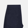 View 5 of product The Turnbull & Asser Light Navy Corduroy Charles Trousers feature a straight-leg fit, stretch cotton, belt loops, front pockets, and a button-zip closure—highlighting British tailoring against a white background.