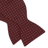 View 4 of product The Turnbull & Asser Burgundy and White Small Spot Printed Silk Bow Tie is shown on a plain white background.