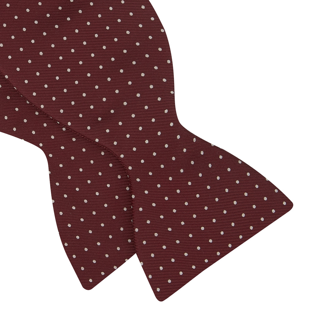 The Turnbull & Asser Burgundy and White Small Spot Printed Silk Bow Tie is shown on a plain white background.