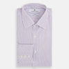View 5 of product The Turnbull & Asser Purple Shadow Stripe Mayfair Shirt features a long-sleeve button-up design with thin vertical blue and white stripes, a T&A collar, and buttoned cuffs, shown on a plain white background.