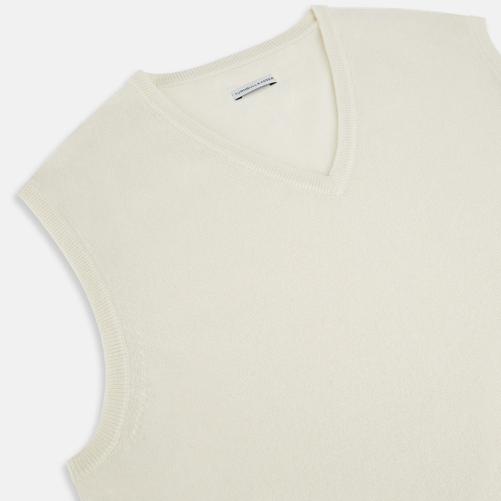 The Turnbull & Asser Ivory Cashmere V-neck Vest is a sleeveless, sophisticated knit pullover shown against a plain white background.