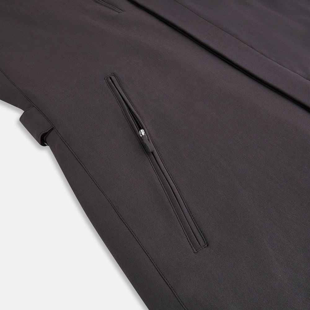 The Dark Chocolate John Arthur Trench Coat by Turnbull & Asser features a pointed collar, two large slanted side pockets, and a vertical chest pocket—a versatile 2-in-1 piece ideal for any occasion.