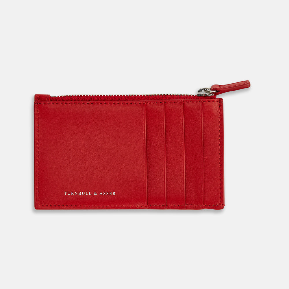 The Red Leather Zip Coin and Card Holder by Turnbull & Asser features four card slots, a slim pocket, a zip compartment, and white embossed branding on the front.