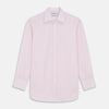 View 1 of product The Pink Windowpane Check Mayfair Shirt by Turnbull & Asser features a light pink, long-sleeve design with subtle windowpane checks, button-down front, and soft organic cotton, shown against a white background.