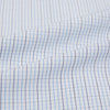 View 6 of product The Turnbull & Asser Pale Blue and Navy Grid Check Mayfair Shirt is a long-sleeve, button-up shirt made from fine Italian cotton, featuring a pointed collar and buttoned cuffs, shown against a plain white background.