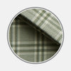 View 1 of product Close-up of Turnbull & Asser's Green Check Cotton Fabric with intersecting green and white lines and squares, displayed within a circular frame against a light gray background.