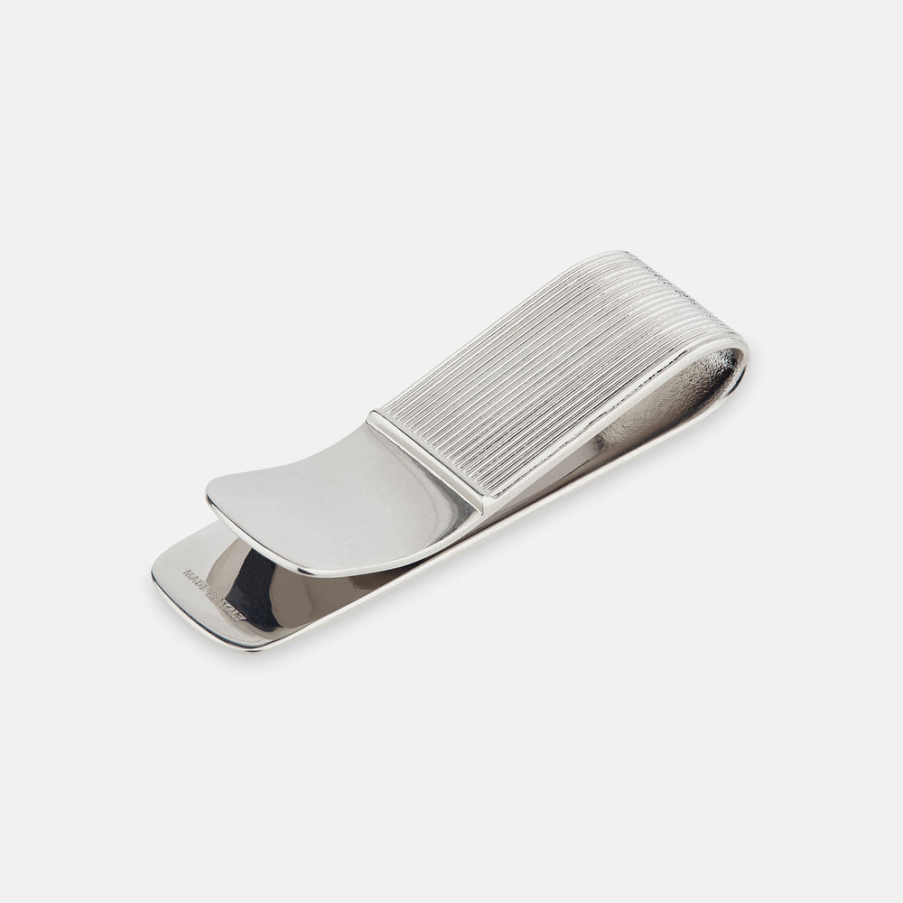 The Turnbull & Asser Silver Striped Money Clip features a ribbed, striped pattern and is displayed against a plain white background.