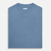 View 4 of product The Turnbull & Asser Pale Blue Fine Merino V-Neck Vest features a sleeveless design, knit texture, and classic V-neckline, shown against a plain white background.