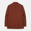 View 7 of product The Turnbull & Asser Rust Linen-Wool-Silk Bertie Blazer is a red double-breasted jacket with peak lapels, black buttons, and flap pockets, tailored in Italy from a luxury linen-wool-silk blend and shown on a white background.