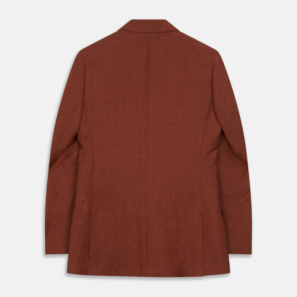 The Turnbull & Asser Rust Linen-Wool-Silk Bertie Blazer is a red double-breasted jacket with peak lapels, black buttons, and flap pockets, tailored in Italy from a luxury linen-wool-silk blend and shown on a white background.