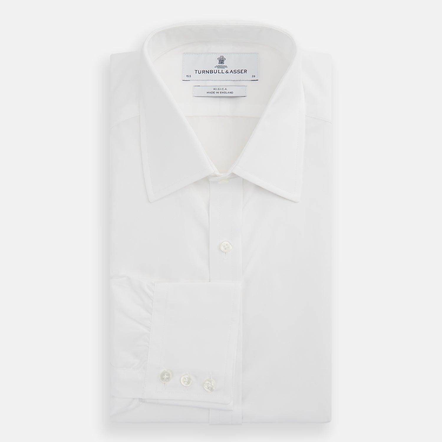 View 4 of product The Turnbull & Asser White West Indian Sea Island Cotton Shirt features a T&A collar, 3-button cuffs, and is crafted from luxurious long-staple cotton for exceptional softness. Displayed against a white background.