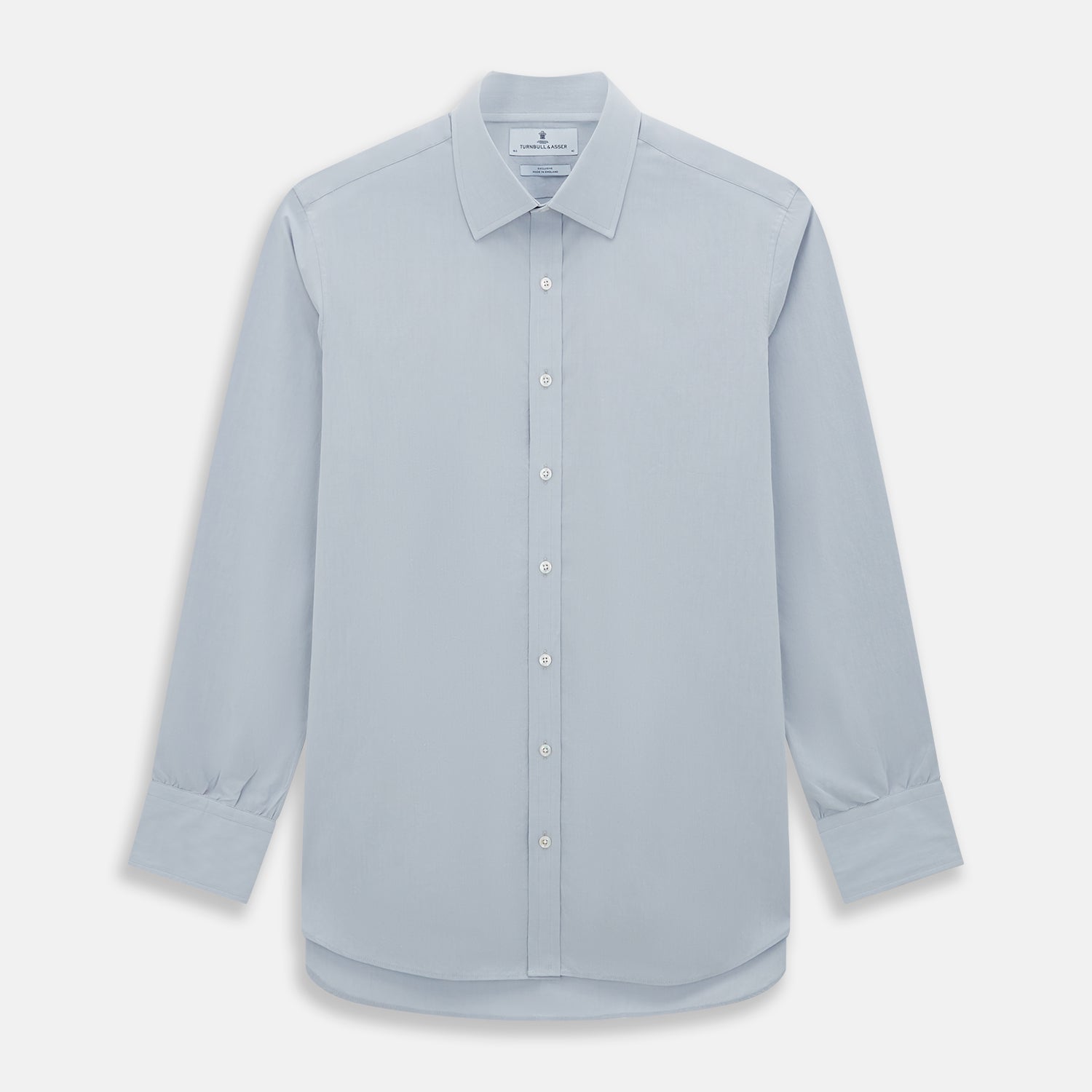 View 1 of product The Dove Grey Mayfair Shirt by Turnbull & Asser is a long-sleeve button-up with a collar, front pocket, and white buttons, crafted from soft sanforised cotton and laid flat on a white background.