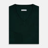 View 4 of product The Turnbull & Asser Forest Green Fine Merino V-Neck Jumper features long sleeves, ribbed cuffs and hem—classic knitwear for any wardrobe, shown on a white background.
