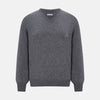 View 1 of product The Turnbull & Asser Storm Grey Cashmere V-neck Jumper features long sleeves, ribbed cuffs and hem—versatile knitwear shown on a white backdrop.