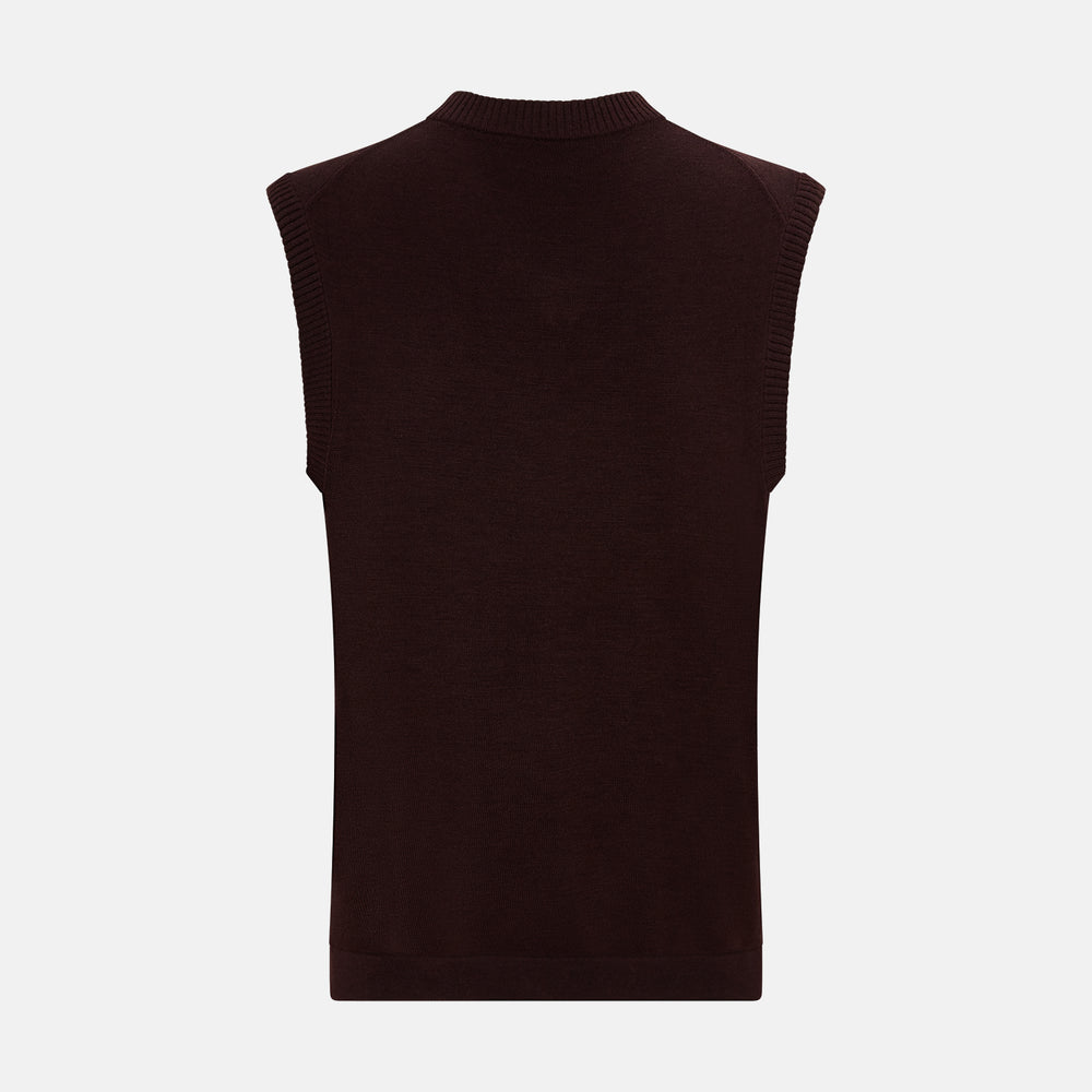 The Turnbull & Asser Burgundy Fine Merino V-Neck Vest is a sleeveless knitwear piece with ribbed trim at the neck, armholes, and hem, shown against a plain white background.
