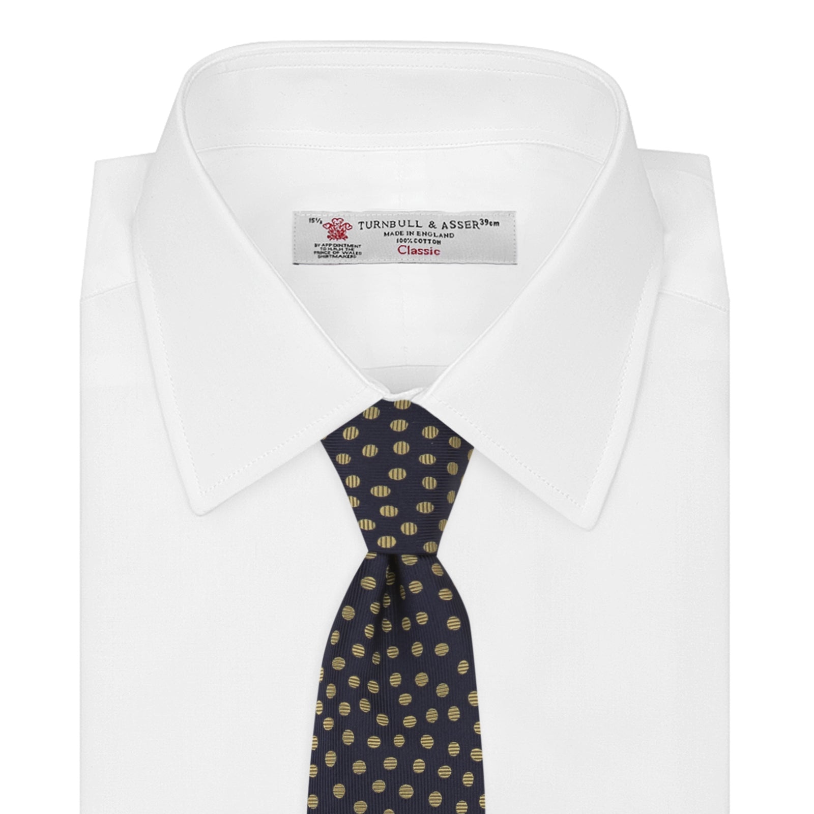 View 2 of product The Turnbull & Asser Navy and Gold Paint Spot Silk Tie features evenly spaced gold spots on classic navy silk, rolled and displayed on a plain white background—ideal for complementing your favorite office shirt.
