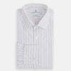 View 5 of product The Turnbull & Asser Pink and Blue Wide Pinstripe Mayfair Shirt features long sleeves, T&A collar, button-down front, and buttoned cuffs. It has bold pink and blue pinstripes on white and is laid flat on a white surface.