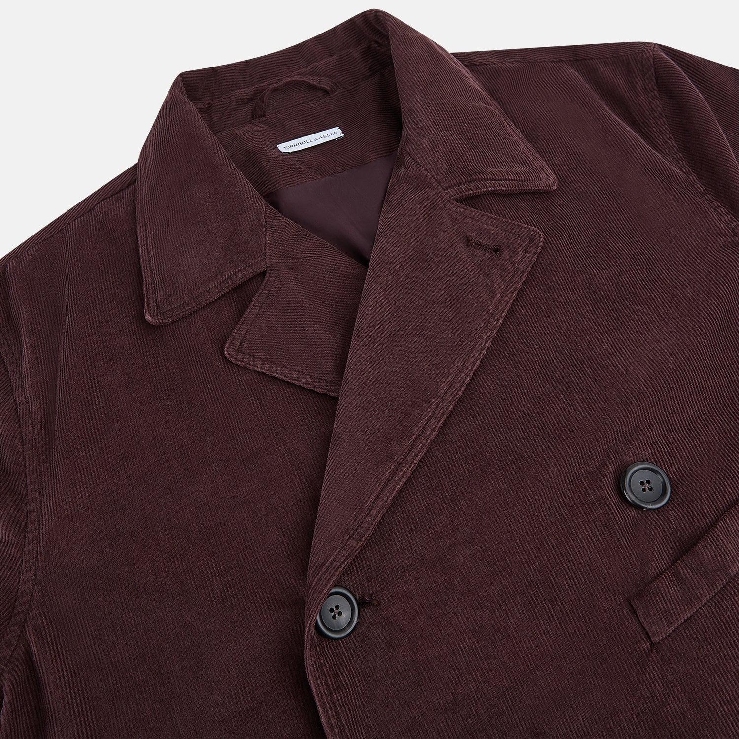 View 2 of product The Burgundy Kingston Corduroy Caban Jacket by Turnbull & Asser features black buttons, a notched collar, and front pockets. Crafted from premium cotton, it is shown on a plain white background.