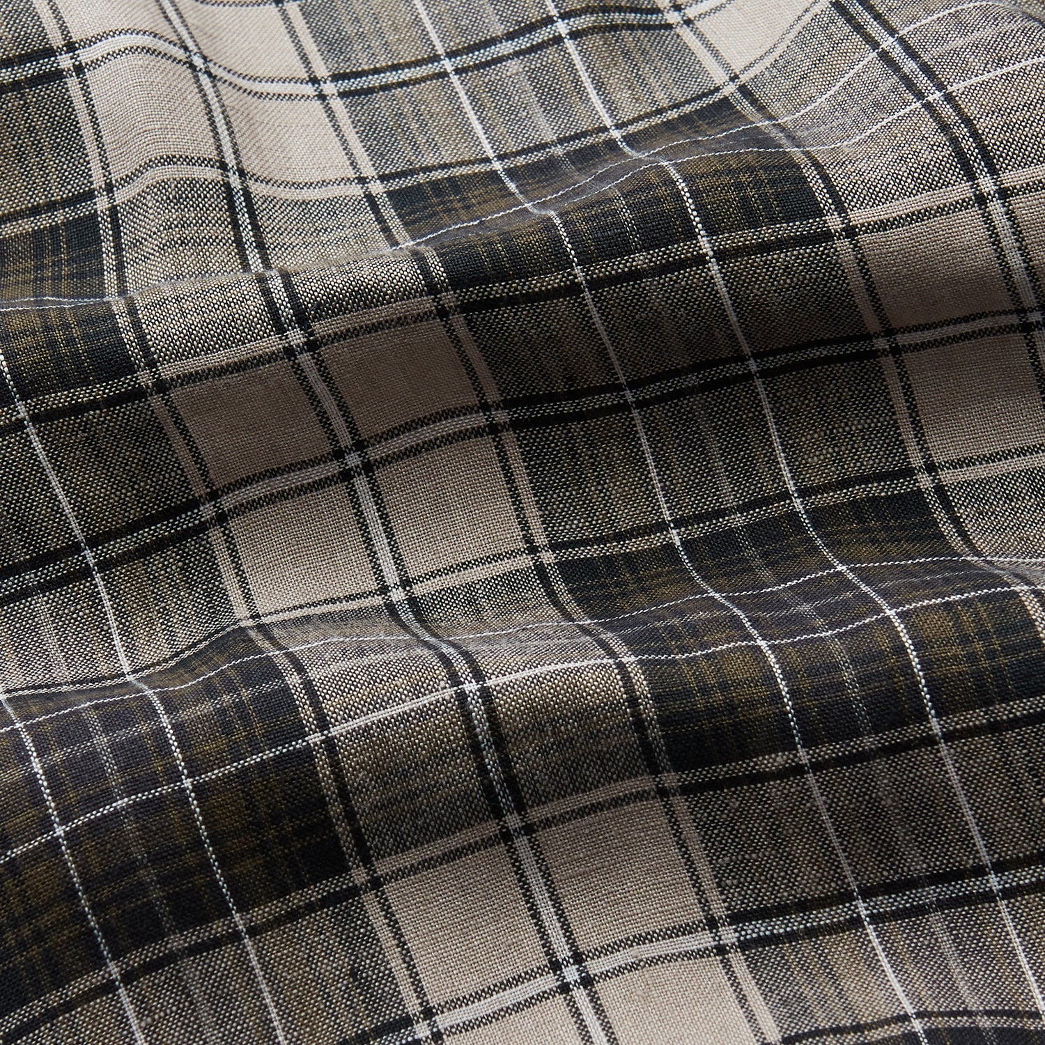 View 4 of product The Brown Multi Check Linen Weekend Fit Unwin Shirt by Turnbull & Asser features a beige, brown, and black plaid pattern, stand collar, button-up front, long sleeves, and two buttoned chest pockets.