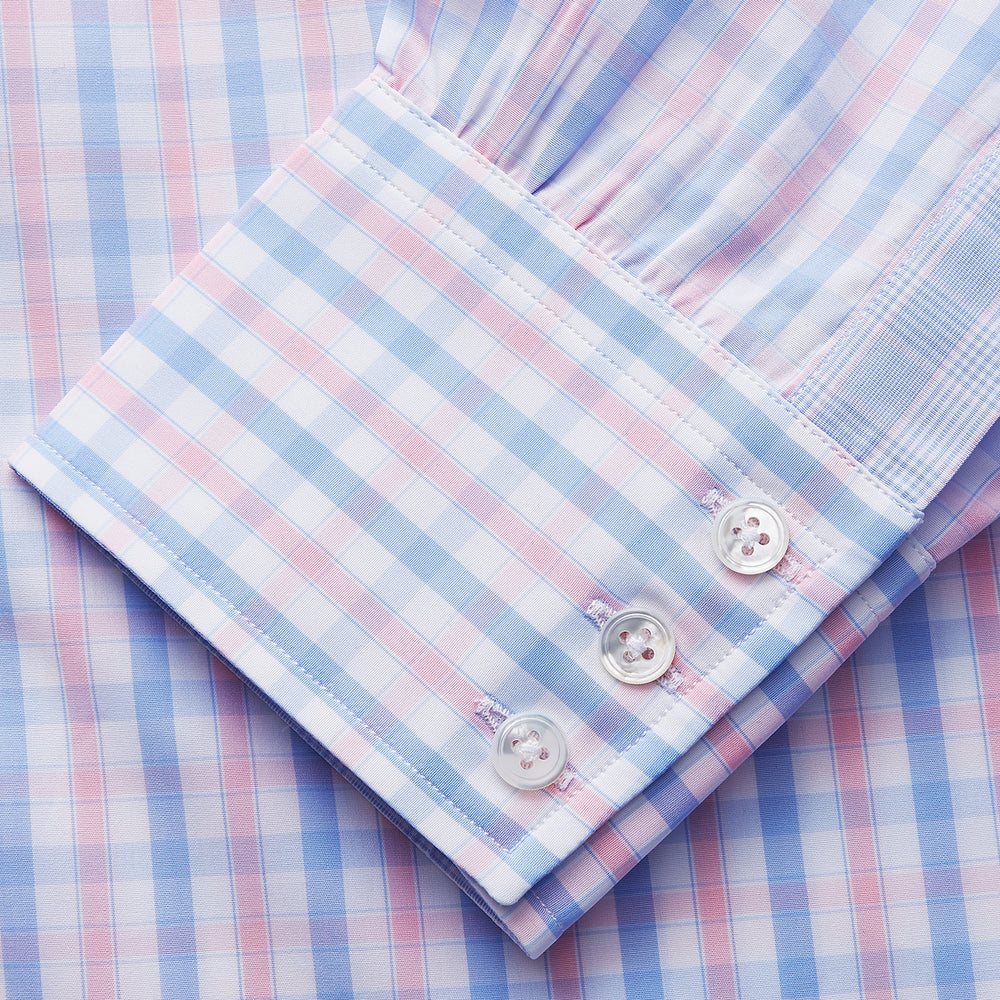 The Turnbull & Asser Red and Blue Multi Check Cotton RE-PURPOSE Mayfair shirt is a sustainable, long-sleeve button-up with a collar and cuffed sleeves, crafted from recycled fabrics and shown laid flat on a white background.
