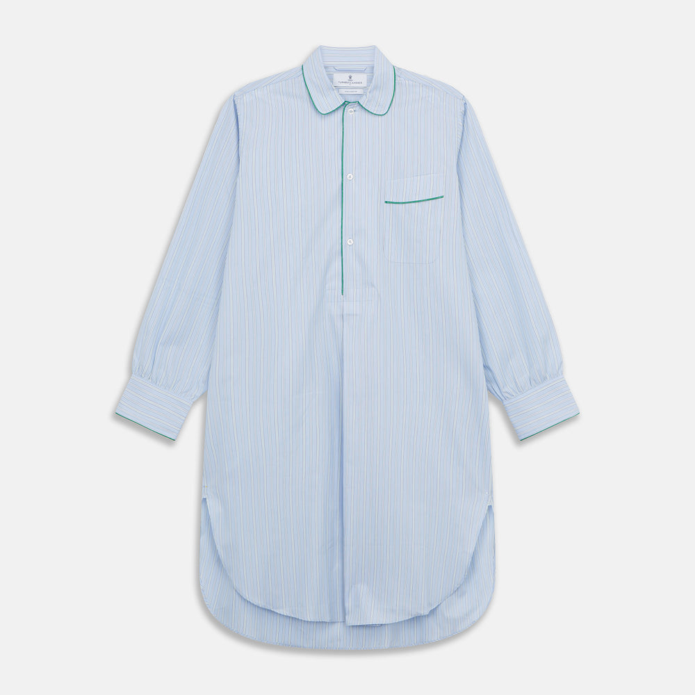 The Turnbull & Asser Blue and Green Stripe Poplin Cotton Nightshirt features long sleeves, a rounded hem, front pocket, green-trimmed collar and pocket, and front buttons—ideal men's nightwear for any season.