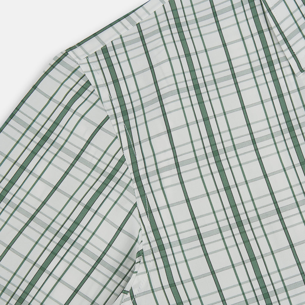 The Turnbull & Asser Sage Green Plaid Check Westminster Shirt features a collared, long-sleeve button-up design with a white base and sage green plaid pattern, showcasing classic British craftsmanship against a clean white background.