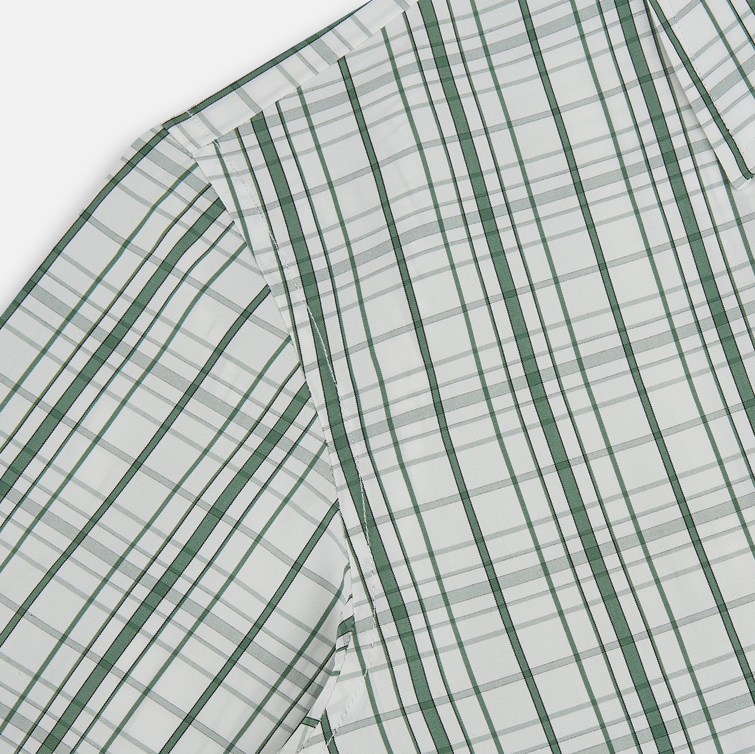 View 6 of product The Turnbull & Asser Sage Green Plaid Check Westminster Shirt features a collared, long-sleeve button-up design with a white base and sage green plaid pattern, showcasing classic British craftsmanship against a clean white background.
