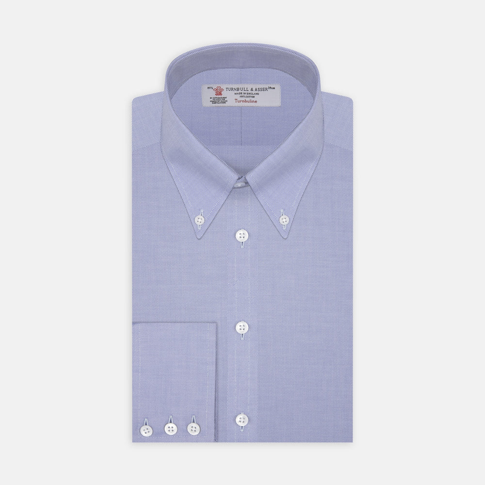 The Turnbull & Asser Blue Royal Oxford Cotton Shirt features a button-down collar, 3-button cuffs, and a visible brand label, shown neatly folded on a white background—ideal for pairing with a navy suit.