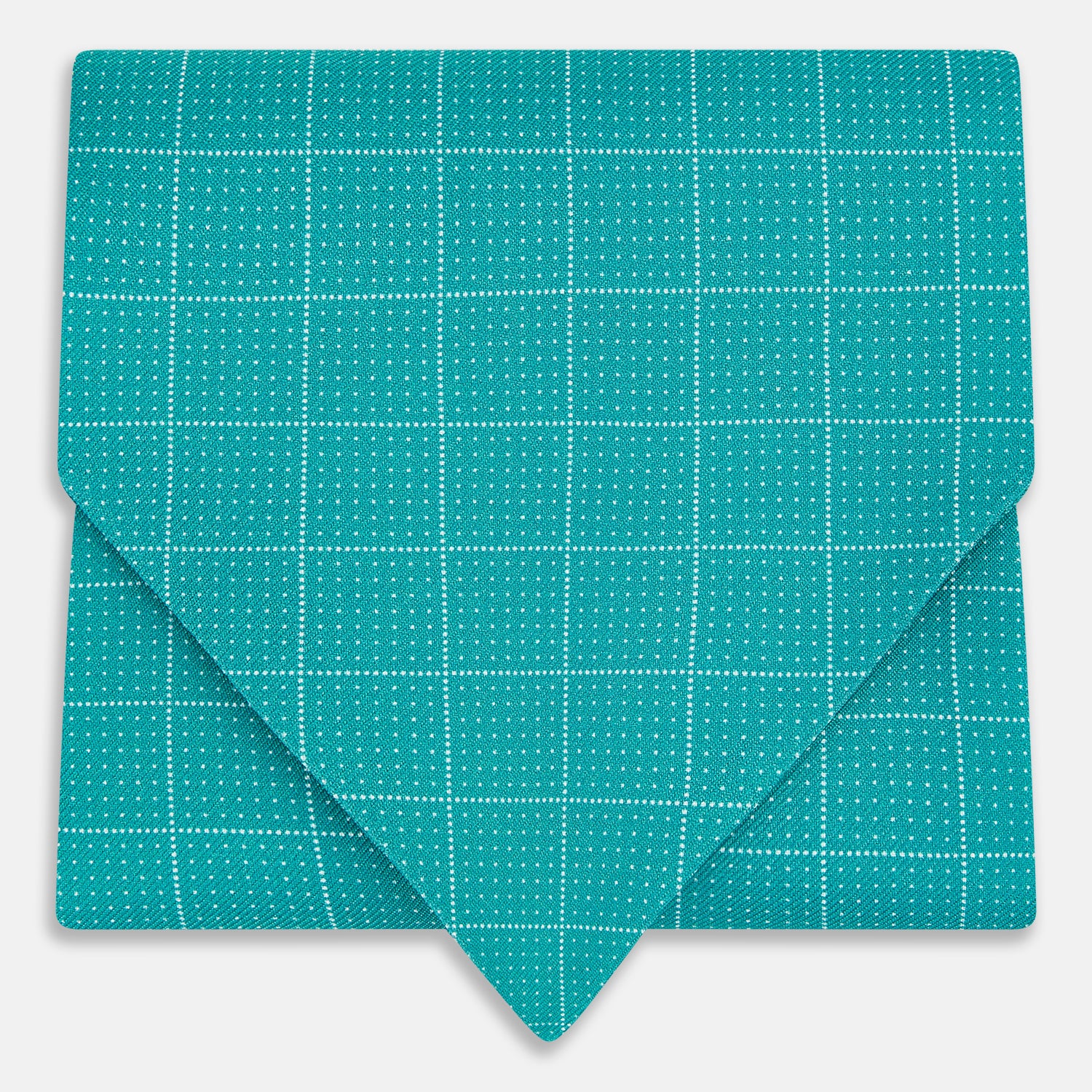 View 1 of product The Turquoise Dotted Check Pattern Printed Silk Cravat by Turnbull & Asser features a neatly folded diamond shape and a refined white dotted grid, showcasing classic style.